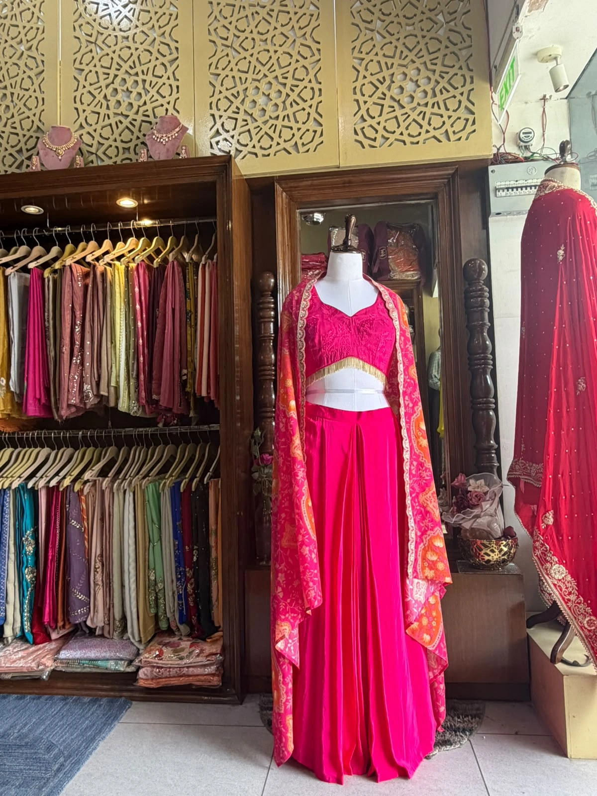 Original pink boutique garment displayed in store