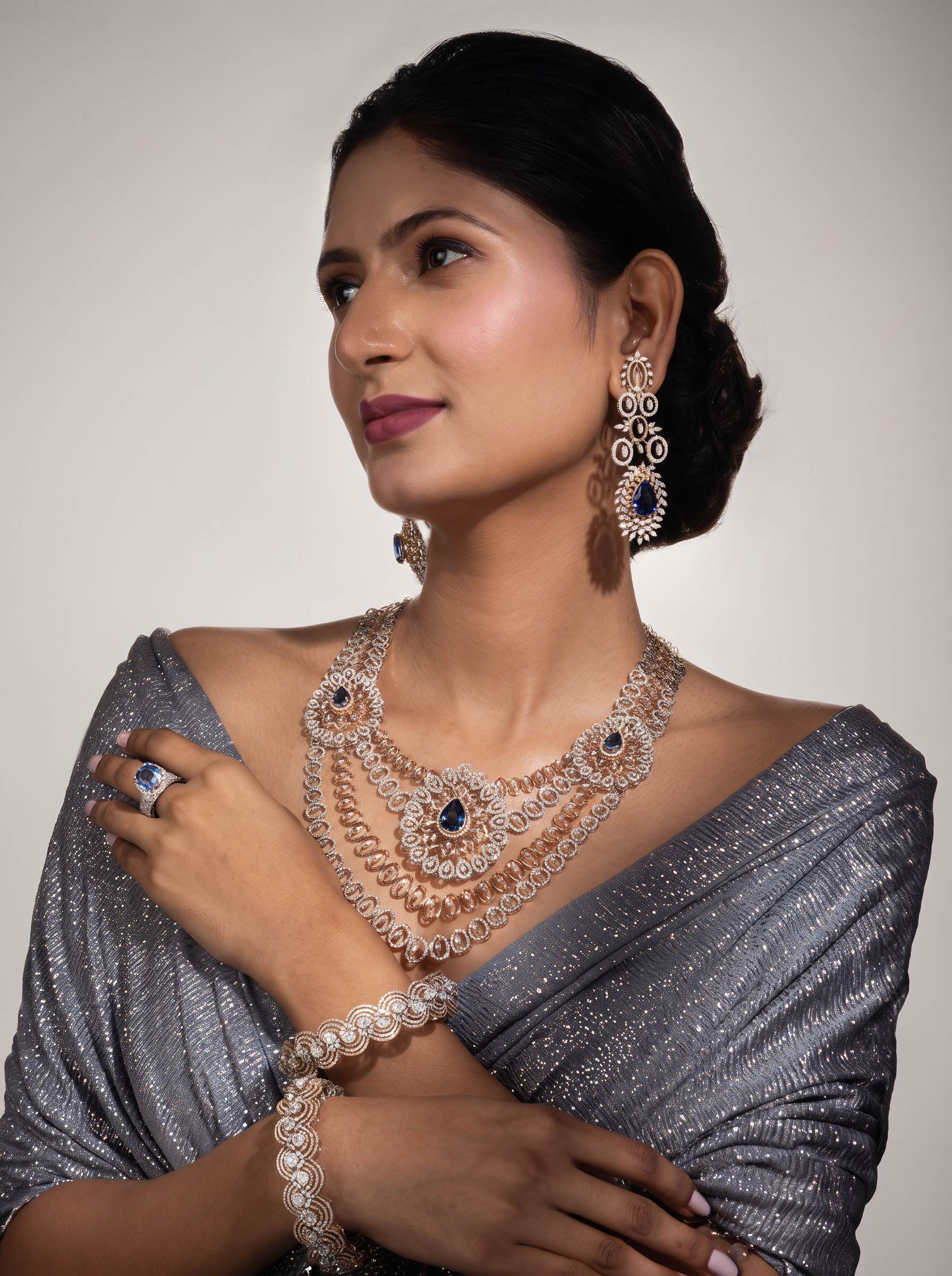 Sapphire and diamond jewellery portrait in silver